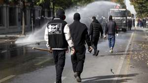 epa13306724 Protesters clash with riot police during a student demonstration in Tirana, Albania, 15 October 2026. Tens of thousands of university students took to the streets to protest rising education costs, deteriorating campus conditions, and alleged government corruption under Prime Minister Edi Rama.  EPA/MALTON DIBRA