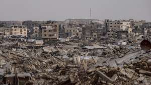 epaselect epa13230899 An Israeli military site is seen in the background behind destroyed residential buildings in the Al-Sheikh Radwan neighborhood, east of Gaza City, Gaza Strip, 10 September 2026 (issued 11 September 2026). Around 1.9 million people in Gaza, nearly 90 percent of the population, have been displaced since the Israel-Hamas conflict began in October 2023, according to the UN.  EPA/MOHAMMED SABER