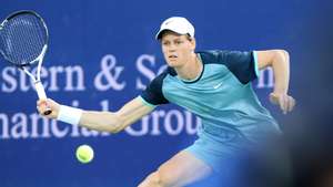 epa11555759 Jannik Sinner of Italy in action against Frances Tiafoe of the United States during the finals of the Cincinnati Open in Mason, Ohio, USA, 19 August 2024.  EPA/MARK LYONS