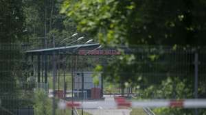 epa09274908 A border crossing point between Rakai, in Lithuania, and Petjulevci, in Belarus, is temporarily closed due to the measures to curb the spreading of the Covid-19 pandemic, in Rakai, Lithuania, 15 June 2016. According to official Lithuanian data, more than 380 illegal migrants from Belarus tried to enter Lithuania unril now in this year. The number is almost five times higher than in the entire year 2020.  EPA/VALDA KALNINA