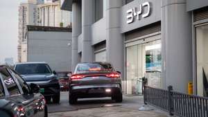 epa11720216 A BYD car dealership that sells electric and hybrid cars is photographed in Beijing, China, 14 November 2024. According to the Chinese Association of Automobile Manufacturers (CAAM), China's annual output of new energy vehicles has surpassed 10 million as of 14 November 2024.  EPA/JESSICA LEE