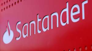 epa12690230 Santander logo outside a branch in London, Britain, 29 January 2026. Santander Bank has announced it is set to close forty-four branches, resulting in job losses of over 290.  EPA/ANDY RAIN