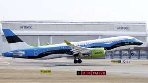 epa12844788 An aircraft YL-CSJ Airbus A220-300 of airBaltic painted in Estonian flag colors takes off at the Riga International Airport (RIX), in Riga, Latvia, 23 March 2026. Riga Airport is a fast-growing Northern European air traffic hub, connecting the Baltic countries with European business centres and popular holiday destinations. By joining the Net Zero 2050 initiative, Riga Airport has committed to achieving climate neutrality by 2050.  EPA/TOMS KALNINS