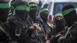epa11874897 Fighters of the Al-Qassam Brigades, the military wing of Hamas, attend the funeral of late Hamas military commander Ghazi Abu Tamaa, head of Hamas' Administrative and Combat Support Staff, in Deir al-Balah refugee camp, southern Gaza Strip, 04 February 2025. Israel and Hamas implemented the first phase of a hostage release and ceasefire deal on 19 January 2025.  EPA/MOHAMMED SABER