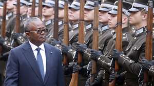 epaselect epa12168118 President of Guinea-Bissau Umaro Sissoco Embalo walks past the honor guard during a welcoming ceremony hosted by the Latvian president prior to their meeting in Riga, Latvia, 10 June 2025. During the meeting, both presidents discussed bilateral relations between the two countries, current security challenges in Africa and Europe, and cooperation in international organizations.  EPA/TOMS KALNINS