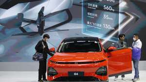 epa11247976 Visitors check Chinese automaker XPENG's G6 electric car displayed at the 45th Bangkok International Motor Show 2024 in Nonthaburi province on the outskirts of Bangkok, Thailand, 28 March 2024. More than 49 leading brands of the world's major automakers attend to exhibit and unveil their automotive products and technology including the new electric vehicles, in the annual automobile showcase amid Thailand's sluggish domestic car sales continuing to decline to the lowest level in two years by 26 percent year-on-year in February 2024, according to the Federation of Thai Industries.  EPA/RUNGROJ YONGRIT