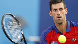 epa09373154 Novak Djokovic of Serbia in action during the Tennis Men's Singles Third Round between Novak Djokovic of Serbia and Alejandro Davidovich Fokina of Spain of the Tokyo 2020 Olympic Games at the Ariake Coliseum in Tokyo, Japan, 28 July 2021.  EPA/RUNGROJ YONGRIT