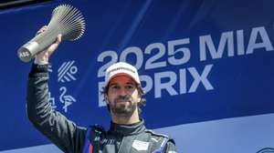 epa12028100 Antonio Felix da Costa of Team TAG Heuer Porsche Formula E Team holds the trophy after winning the third place of the Miami E-Prix at the Homestead Miami Speedway in Homestead, Florida, USA, 12 April 2025.  EPA/CRISTOBAL HERRERA-ULASHKEVICH
