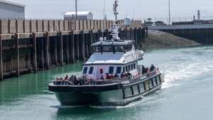 epa10105603 A Border Force Volunteer rescue boat returning from the English Channel, which escorted 90 migrants to Dover, Britain, 04 August 2022. A report from the United Nations High Commissioner for Refugees and the British Red Cross has found that critical gaps in the UK asylum system may result in people being at risk of potential exploitation when they arrive in the UK.  EPA/STUART BROCK