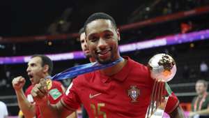 epa09504596 Portugal&#039;s Pauleta celebrates with the trophy during the award ceremony after winning the FIFA Futsal World Cup Lithuania 2021 final between Argentina and Portugal in Kaunas, Lithuania, 03 October 2021.  EPA/TOMS KALNINS