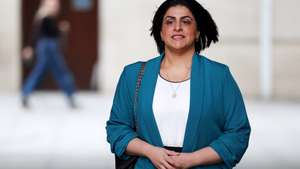 epa12528895 British Home Secretary Shabana Mahmood departs the BBC in London, Britain, 16 November 2025. Mahmood is expected to announce changes to Britain's asylum system in a statement to Parliament on 17 November, under which refugees will no longer be granted permanent stay in the UK.  EPA/ANDY RAIN