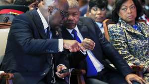 epa13115829 Angola's President Joao Lourenco (C) and Congo's President Felix Tshisekedi (L) attend the opening of the International Conference of the United Nations Alliance of Civilisations (UNAOC) in Luanda, Angola, 16 July 2026. The conference, held under the theme 'A Call for Peace, the End of Wars and Respect for International Law,' brings together political leaders, diplomats, and representatives of international organisations for a high-level discussion on the path to peace, conflict prevention and resolution, respect for international law, and the strengthening of multilateralism.  EPA/AMPE ROGERIO