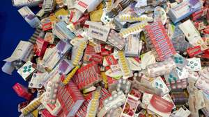 epa06674408 Confiscated medicines are presented during the Customs Report 2017 in Berlin, Germany, 17 April 2018. In 2016, customs had withdrawn fake goods worth 180 million euro and 120 million cigarettes. In addition, staff for the fight against money laundering and terror financing had been significantly strengthened in 2017.  EPA/HAYOUNG JEON