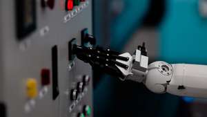 epa12894278 A robot performs tasks in a Southern Power Grid company laboratory during a government-organised visit in Guangzhou, Guangdong province, China, 16 April 2026. Shenzhen’s “Robot Valley,” which covers about 28 square kilometres, has attracted more than 200 robotics companies, including specialised firms and listed companies, creating a broad ecosystem for robot research, manufacturing and innovation.  EPA/ALEX PLAVEVSKI