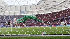 epa11422919 Klaus Gjasula (L) of Albania scores the 2-2final goal during the UEFA EURO 2024 group B match between Croatia and Albania, in Hamburg, Germany, 19 June 2024.  EPA/ROBERT GHEMENT