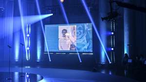epa08860342 Pictures of Iranian Human rights lawyer Nasrin Sotoudeh are seen on a screen as she was awarded with the 2020 Right Livelihood Award in Stockholm, Sweden, 03 December 2020. Bialiatski was the only one of four prize winners, including Iranian human rights lawyer Nasrin Sotoudeh, US lawyer and activist Bryan Stevenson and Nicaraguan lawyer Lottie Cunningham Wren, to be present in Stockholm for the digital award ceremony.  EPA/ANDERS WIKLUND SWEDEN OUT