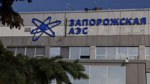 epa10692547 A picture taken during a visit to Enerhodar organised by the Russian Defence ministry shows a general view of the administrative building of the Zaporizhzhia Nuclear Power Plant in Enerhodar, southeastern Ukraine, 15 June 2023. The Zaporizhzhia Nuclear Power Plant can still continue to draw water from the Kakhovka reservoir, the IAEA reports. Grossi said that after the destruction of the Kakhovka hydroelectric power station, a situation may arise when the water from the Kakhovka reservoir will not be enough to cool the reactors of the Zaporozhye nuclear power plant. According to him, in this case, the reactors can be damaged, which threatens with the onset of radiological consequences. The water level in the reservoir near the Zaporizhzhya TPP has dropped to 11.27 meters and continues to decline.  EPA/SERGEI ILNITSKY