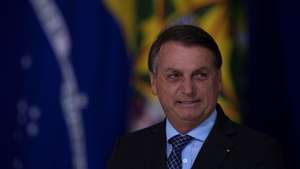 epa08810541 President of Brazil Jair Bolsonaro participates in the launch of the Alliance for Volunteering and the Friends of the Country Award, in Brasilia, Brazil, 09 November 2020.  EPA/Joedson Alves
