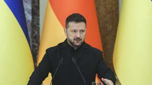 epa13280791 Ukraine's President Volodymyr Zelensky speaks during a joint press conference with Germany's Chancellor Friedrich Merz (not pictured) at the Mariinskyi Palace in Kyiv, Ukraine, 04 October 2026. Friedrich Merz arrived in Kyiv to meet with top Ukrainian officials amid the ongoing Russian invasion.  EPA/SERGEY DOLZHENKO