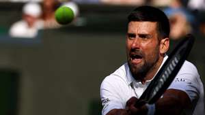 epa13103384 Novak Djokovic of Serbia in action during his Men's Singles semifinal match against Jannik Sinner of Italy at the Wimbledon Championships in London, Britain, 10 July 2026.  EPA/NEIL HALL