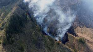 epa13159208 An aerial photo shows a general view of the wildfire at an affected area in Bromo Tengger Semeru National park, Pasuruan, East Java, Indonesia, 10 August 2026. Authorities closed the national park including the famous Mount Bromo for all tourists activities following the wildfire.  EPA/SADEWA