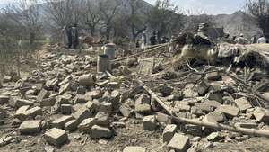 epa13253859 People inspect the damage at the site of an alleged Pakistani airstrike in Noorgul district of Kunar, Afghanistan, 21 September 2026. According to Taliban authorities, three people were killed and four others were injured in Kunar and Paktika provinces. Pakistan has not officially confirmed carrying out the strikes. Islamabad has repeatedly accused the Taliban authorities of allowing militant groups to operate from Afghan territory and carry out attacks in Pakistan, allegations Kabul denies.  EPA/STRINGER