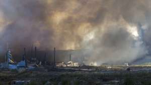 epa13194353 Smoke rises at the site of a Russian strike on a goods storage near Kyiv, Ukraine, 27 August 2026, amid the Russian invasion. After the overnight Russian combined shelling, Ukrainian rescuers are working at 9 locations. Among them are private homes, warehouses, and fire outbreaks in ecosystems, according to the Ukrainian State Emergency Service (SES).  EPA/SERGEY DOLZHENKO