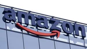 epa10390356 The Amazon logo is displayed on the exterior of an Amazon software development center (Amazon Web Services) in Bucharest, Romania, 05 January 2023. According to CEO Andy Jassy, Amazon is planning to lay off more than 18,000 employees as part of a workforce reduction.  EPA/ROBERT GHEMENT