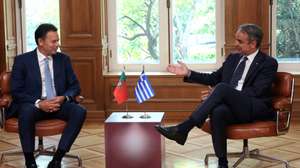 epa13126120 Greek Prime Minister Kyriakos Mitsotakis (R) speaks with Portuguese Prime Minister Luis Montenegro (L) during their meeting at the Maximos Mansion in Athens, Greece, 22 July 2026. Montenegro is in Athens for a bilateral working meeting with his Greek counterpart.  EPA/ORESTIS PANAGIOTOU
