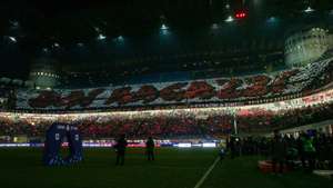 epa09650944 AC Milan fans coreaography is seen before the Italian Serie A soccer match AC Milan vs SSC Napoli at Giuseppe Meazza Stadium in Milan, Italy, 19 December 2021.  EPA/ROBERTO BREGANI