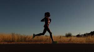 epa10077772 Ruth Chepngetich of Kenya competes during the women's Marathon race at the World Athletics Championships Oregon22 in Eugene, Oregon, USA, 18 July 2022.  EPA/Etienne Laurent