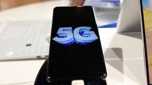 epa08545341 A 5G phone at a store in London, Britain, 14 July 2020. According to news reports, the British government is to exclude leading Chinese technology company Huawei from involvement in Britain's future 5G telecoms networks. Dowden also said telecoms operators in UK will have to remove by 2027 any Huawei equipment. Telecoms operators will also not be allowed to purchase Huawei equipment by the end of 2020.  EPA/ANDY RAIN