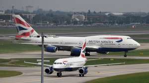 epa08551506 A British Airways Boeing 747 aircraft (behind)  taxis at Heathrow Airport in London, Britain, 29 May 2017 (reisued 17 July 2020). Britain's flagship aircraft carrier British Airways on 17 July 2020 confirmed the immediate retirement of its entire Boeing 747 fleet following the devastating impact of the coronavirus pandemic on air travel and its business.  EPA/ANDY RAIN *** Local Caption *** 54850332