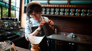 epa12998006 An employee makes coffee in a Starbucks cafe, during a government-substituted tour in Hangzhou, Zhejiang province, China, 27 May 2026.  EPA/ALEX PLAVEVSKI