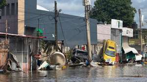 epa12446168 A flooded street with debris caused by heavy rains in Poza Rica, Mexico, 10 October 2025.  Dozens of people were killed and several remain missing after heavy rains caused widespread flooding across Mexico.  EPA/MIGUEL VICTORIA