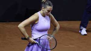 epa12044403 Aryna Sabalenka of Belarus reacts during her final match against Jelena Ostapenko of Latvia at the WTA Tennis Grand Prix tournament in Stuttgart, Germany, 21 April 2025.  EPA/RONALD WITTEK