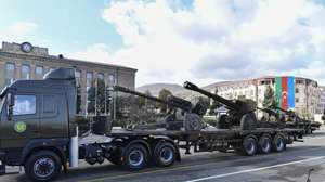epa10963973 Azeri military equipment showcased during a military parade marking the third anniversary of the Victory in the Patriotic War, in the former capital of Nagorno-Karabakh region, known to Armenians as Stepanakert, and in Azerbaijan as Khankendi, Azerbaijan, 08 November 2023. Azerbaijan on 19 September 2023 launched a brief military offensive in the contested region of Nagorno-Karabakh, a breakaway enclave home to some 120,000 ethnic Armenians. Following a ceasefire agreed on the following day, Azerbaijan opened all checkpoints with Armenia for the unimpeded exit of civilians from the disputed territory. The Armenian government announced the evacuation of more than 100,000 local residents from Nagorno-Karabakh, and a humanitarian center was set up in the village of Kornidzor near the so-called Lachin corridor, the main route between Armenia and the breakaway region. Nagorno-Karabakh will cease to exist as a self-proclaimed state from 01 January 2024, the region's separatist leader, Samvel Shakhramanyan, announced on 28 September 2023, after signing a decree to dissolve all its institutions.  EPA/STRINGER