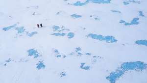 epa08429217 Two scientists walk on blue ice around Rossman Cove near the Glaciar Union camp in the Ellsworth Mountains, Antarctica, 25 November 2018 (re-issued 18 May 2020). As prominent in both sky and sea, the color blue is often associated with open spaces, freedom, depth and wisdom. In psychology blue is viewed as a non-threatening color and it is believed to have positive and calming effects on body and mind. Often linked with intellect, confidence and reliability, it is known in corporate America as a power color.  EPA/FELIPE TRUEBA ATTENTION: This Image is part of a PHOTO SET *** Local Caption *** 54951400