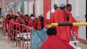 epa12799818 Some of the rescued migrants rest at a station in Fuerteventura, Spain, 06 March 2026. The Salvamar Izar rescue vessel, operated by the Spanish Maritime Safety Agency, rescued 60 people of North African and sub-Saharan origin from an inflatable boat at 12:35 PM, 50 kilometers southeast of Fuerteventura. The boat had been missing for several days. According to the Red Cross, the group consists of 56 men, two women, and two minors, all of whom are in good health.  EPA/Anna Kuznetsova