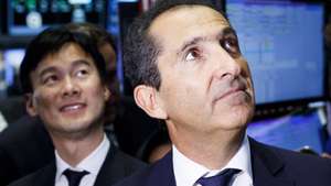 epa07654345 (FILE) -  Patrick Drahi (R), the founder of Altice, and Dexter Goei (L), the CEO of Altice USA, watch during the initial public offering of Altice USA, a cable and telecommunications company, on the floor of the New York Stock Exchange in New York, New York, USA, 22 June 2017, reissued 17 June 2019. Media reports on 17 June 2019 state that Sotheby’s (NYSE: BID) announced that it has signed a definitive merger agreement to be acquired by BidFair USA, an entity wholly owned by media and telecom entrepreneur as well as art collector, Patrick Drahi. Under the terms of the agreement, which was approved by Sotheby’s Board of Directors, shareholders, including employee shareholders, will receive 57.00 US dollars in cash per share of Sotheby’s common stock in a transaction with an enterprise value of 3.7 billion US dollars. The transaction would result in Sotheby’s returning to private ownership after 31 years as a public company traded on the New York Stock Exchange.  EPA/JUSTIN LANE *** Local Caption *** 53601088