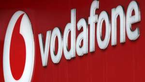 epa12258366 A view of the Vodafone logo in a Vodafone store in London, Britain, 24 July 2025. The company reported a 5.5% rise in group organic service revenue in the first quarter, a slight increase on the previous quarter, following their recent merger with Three.  EPA/ANDY RAIN