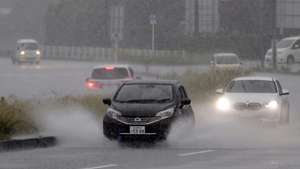epa13068467 Vehicles drive through heavy rain caused by typhoon Mekkhala in Tateyama, Chiba prefecture, near Tokyo, Japan, 27 June 2026. The Japan Meteorological Agency (JMA) has placed large swathes of the country under high alert for flooding, swollen rivers, and landslides, as the country deals with a rare double-tropical storm threat from Mekkhala (Typhoon No. 7) and Higos (Typhoon No. 8). Mekkhala is moving rapidly northeastward along the Pacific coast toward the Kanto Plain, and it is expected to become an extratropical cyclone by early 28 June.  EPA/FRANCK ROBICHON
