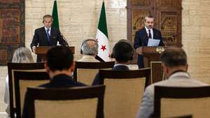 epa13177384 Syrian Foreign Minister Asaad Al-Shaibani (R) speaks during a joint press conference with Rafael Grossi (L), director general of the International Atomic Energy Agency (IAEA), in the former presidential Tishreen Palace in Damascus, Syria, 18 August 2026.  EPA/MOHAMED AL RIFAI