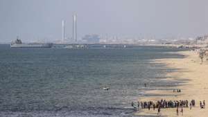 epa11353661 A ship is seen from southern Gaza, moored near a temporary floating pier anchored by the United States to boost aid deliveries, Gaza, 19 May 2024. Since 07 October 2023, up to 1.7 million people, or more than 75 percent of the population, have been displaced throughout the Gaza Strip, some more than once, in search of safety, according to the United Nations Relief and Works Agency for Palestine Refugees in the Near East (UNRWA), which added that the Palestinian enclave is &#039;on the brink of famine&#039;, with 1.1 million people (half of its population) &#039;experiencing catastrophic food insecurity&#039; due to the conflict and restrictions on humanitarian access.  EPA/MOHAMMED SABER