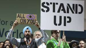 epa11737266 A handout picture made available by UN Climate Change shows climate activists attend a protest at the UN Climate Change Conference COP29 in Baku, Azerbaijan, 23 November 2024.  EPA/COP29 AZERBAIJAN / HANDOUTS  HANDOUT EDITORIAL USE ONLY/NO SALES
