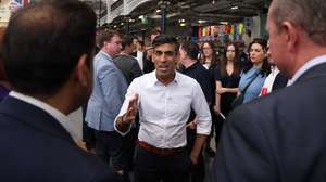 epa10779919 Britain's Prime Minister Rishi Sunak (C) attends the Great British Beer Festival in London Britain, 01 August 2023. The UK government is now taxing all alcohol based on its strength, rather than the previous categories of wine, beer, spirits, and ciders. The increase will see duty rise by 44p on a bottle of wine, a bottle of gin or vodka will rise by about 90p. Duty on draught pints across the UK will be cut by 11p.  EPA/NEIL HALL