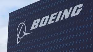 epa11491586 The Boeing logo is pictured on the opening day of the Farnborough International Airshow in Farnborough, Britain, 22 July 2024. The aviation summit is typically a platform for planemakers to rack up multibillion-dollar deals. The airshow runs from 22 to 26 July.  EPA/NEIL HALL