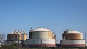 epa12833417 Storage tanks at Grain LNG, Europe's largest liquefied natural gas terminal on the Isle of Grain, Britain 19 March 2026. Global gas and oil prices have risen following attacks by Israel and Iran on refineries in the Middle East as the conflict continues. European leaders have announced they were ready to join “appropriate efforts” to reopen the Strait of Hormuz, where Iran has attacked ships to effectively close the shipping route.  EPA/NEIL HALL