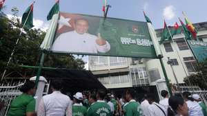 epa12487110 Members of the Union Solidarity and Development Party (USDP) attend the unveiling of the party slogan poster at the USDP Yangon division office in Yangon, Myanmar, 28 October 2025. The military-backed USDP has started its campaign ahead of the general election, arranged by the Myanmar military junta on 28 December 2025.  EPA/NYEIN CHAN NAING