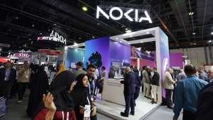 epa12451012 People visit the pavilion of Nokia at the Gulf Information Technology Exhibition (GITEX) Global 2025 in the Gulf emirate of Dubai, United Arab Emirates, 13 October 2025. The 45th edition of the annual GITEX Global runs until 17th October 2025.  EPA/ALI HAIDER